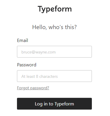 Captura de tela da seção de login do site Typeform. No campo de "E-mail", o nome de Bruce Wayne, o Batman, personagem da cultura popular, é exibido como um exemplo de preenchimento.
